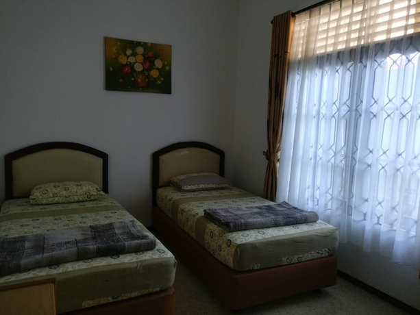 Imagen de la habitación del Hotel Wisma Liontine. Foto 11