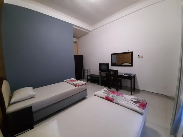 Imagen de la habitación del Hotel Wisma Liontine. Foto 12