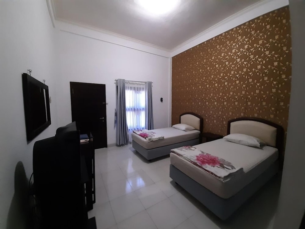 Imagen de la habitación del Hotel Wisma Liontine. Foto 13