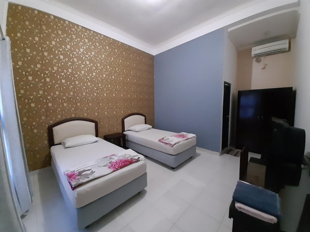 Imagen de la habitación del Hotel Wisma Liontine. Foto 15