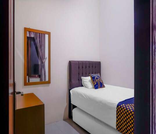 Imagen de la habitación del Hotel Wisma Madinah Syariah. Foto 5
