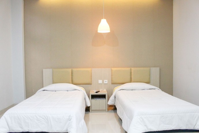 Imagen de la habitación del Hotel Wisma Makara Suite Powered By Archipelago. Foto 7