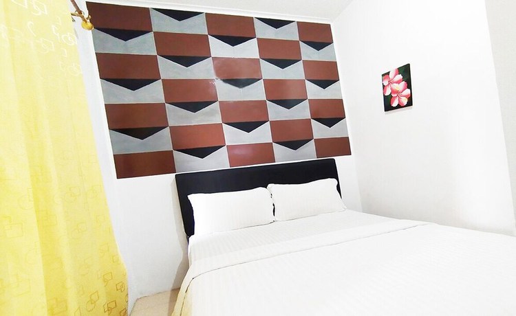 Imagen de la habitación del Hotel Wisma Mulia Syariah. Foto 8