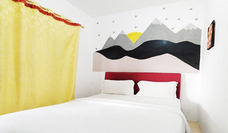 Imagen de la habitación del Hotel Wisma Mulia Syariah. Foto 9