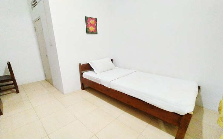 Imagen de la habitación del Hotel Wisma Mulia Syariah. Foto 11