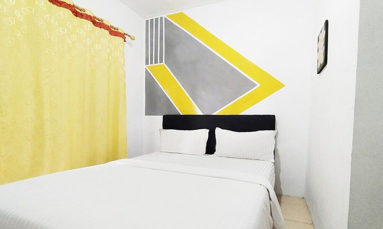 Imagen de la habitación del Hotel Wisma Mulia Syariah. Foto 12