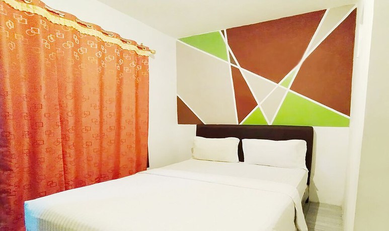 Imagen de la habitación del Hotel Wisma Mulia Syariah. Foto 14