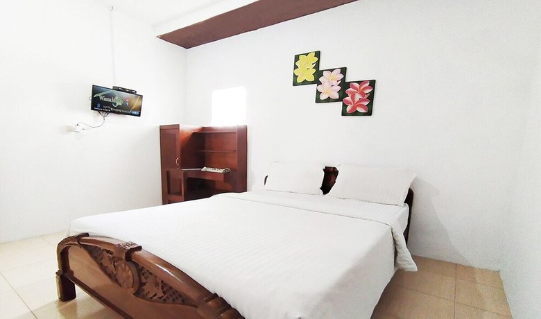 Imagen de la habitación del Hotel Wisma Mulia Syariah. Foto 15