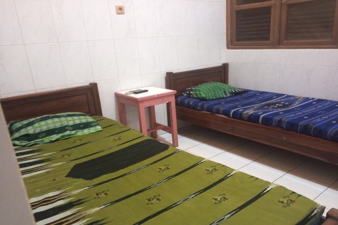 Imagen de la habitación del Hotel Wisma Pelita Syariah. Foto 2