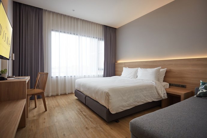 Imagen de la habitación del Hotel Wisma Ratchaburi. Foto 4
