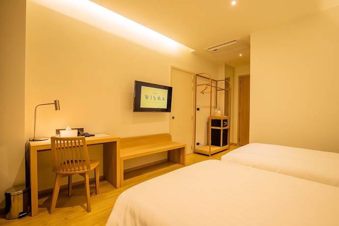 Imagen de la habitación del Hotel Wisma Ratchaburi. Foto 7