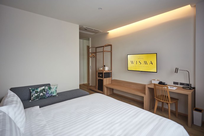 Imagen de la habitación del Hotel Wisma Ratchaburi. Foto 9