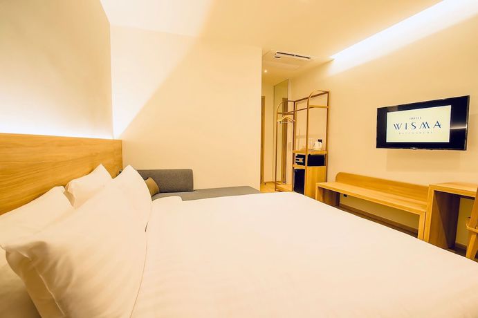 Imagen de la habitación del Hotel Wisma Ratchaburi. Foto 15