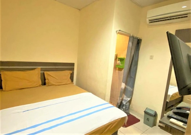 Imagen de la habitación del Hotel Wisma Robinson. Foto 19