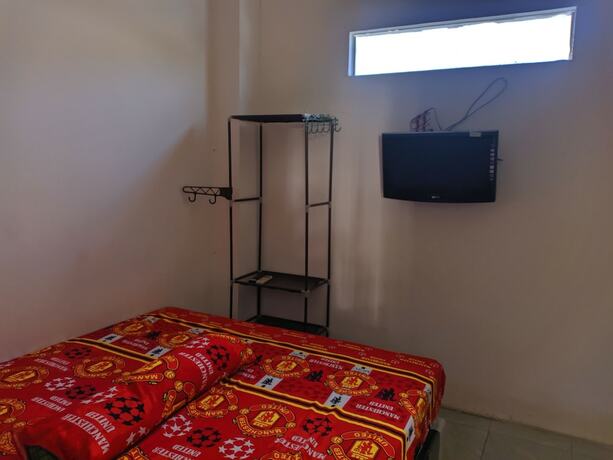 Imagen de la habitación del Hotel Wisma Sarjana Guesthouse. Foto 14