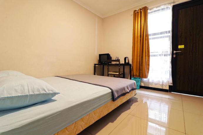 Imagen de la habitación del Hotel Wisma Surya. Foto 4