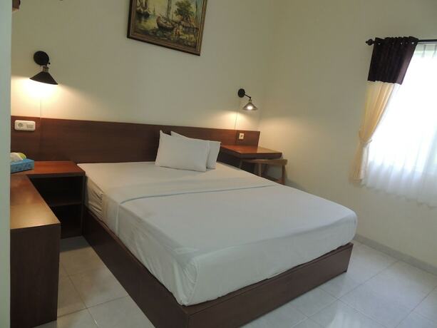 Imagen de la habitación del Hotel Wisma Tamu UKSW. Foto 16