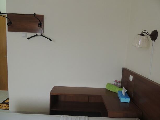 Imagen de la habitación del Hotel Wisma Tamu UKSW. Foto 20