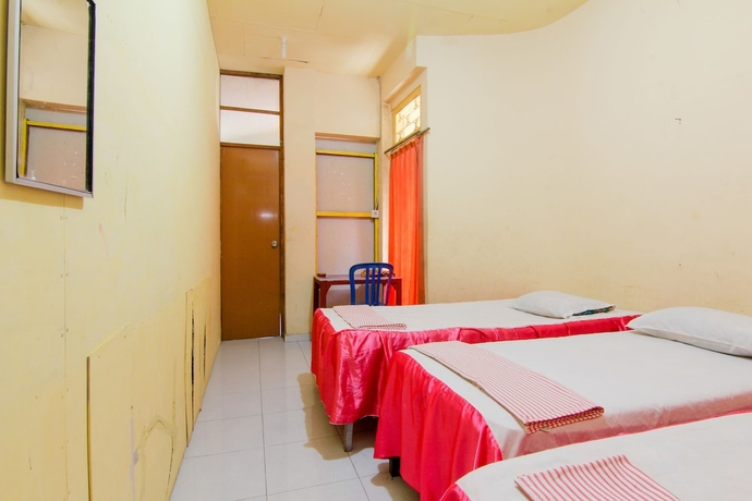 Imagen de la habitación del Hotel Wisma TheBlossom. Foto 3