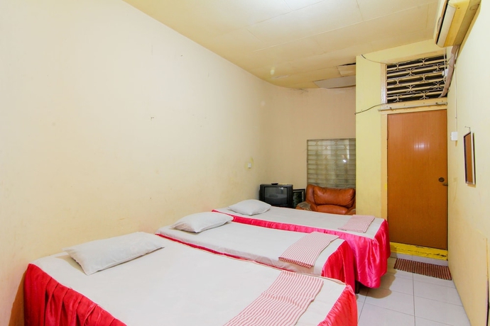 Imagen de la habitación del Hotel Wisma TheBlossom. Foto 4