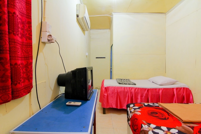 Imagen de la habitación del Hotel Wisma TheBlossom. Foto 5