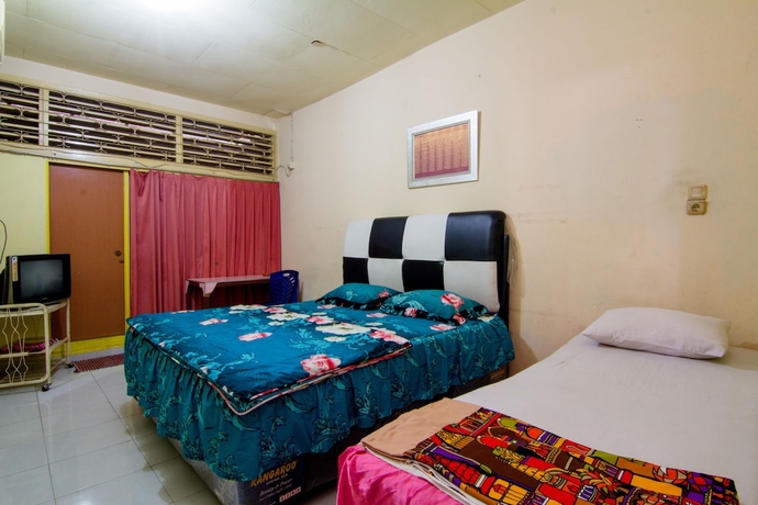 Imagen de la habitación del Hotel Wisma TheBlossom. Foto 6