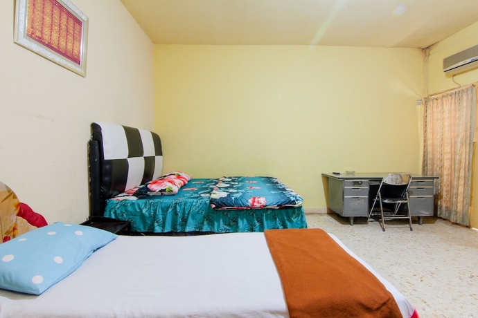 Imagen de la habitación del Hotel Wisma TheBlossom. Foto 7