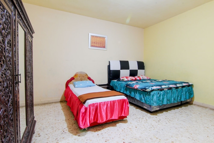 Imagen de la habitación del Hotel Wisma TheBlossom. Foto 8