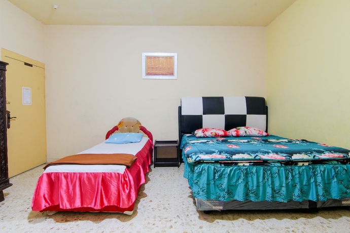 Imagen de la habitación del Hotel Wisma TheBlossom. Foto 9