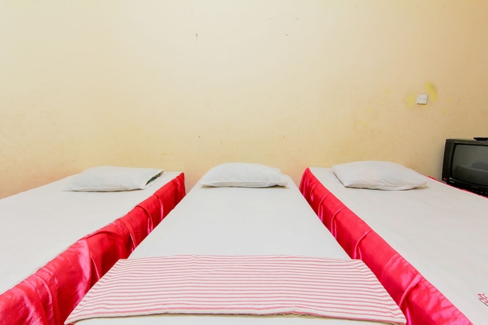 Imagen de la habitación del Hotel Wisma TheBlossom. Foto 10