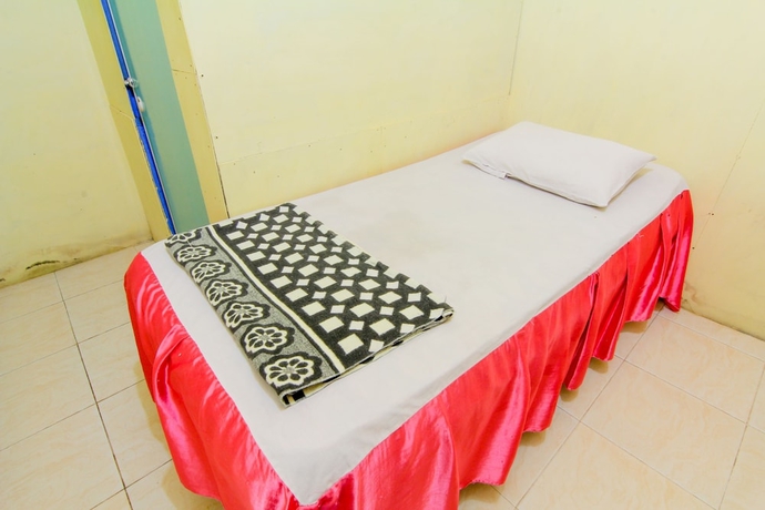 Imagen de la habitación del Hotel Wisma TheBlossom. Foto 11