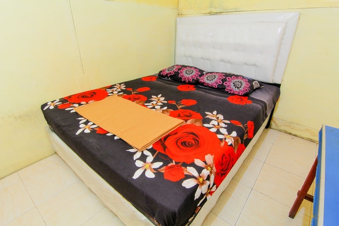 Imagen de la habitación del Hotel Wisma TheBlossom. Foto 12