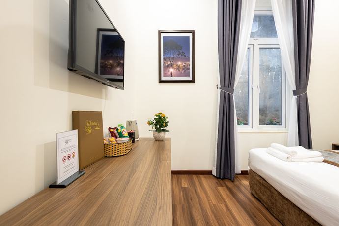 Imagen de la habitación del Hotel Wisteria. Foto 12
