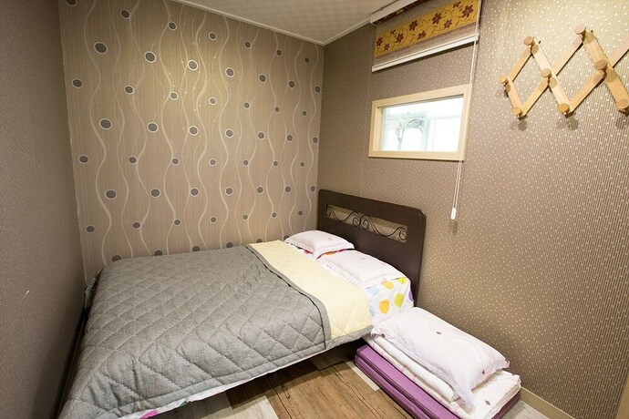 Imagen de la habitación del Hotel With Guesthouse. Foto 9