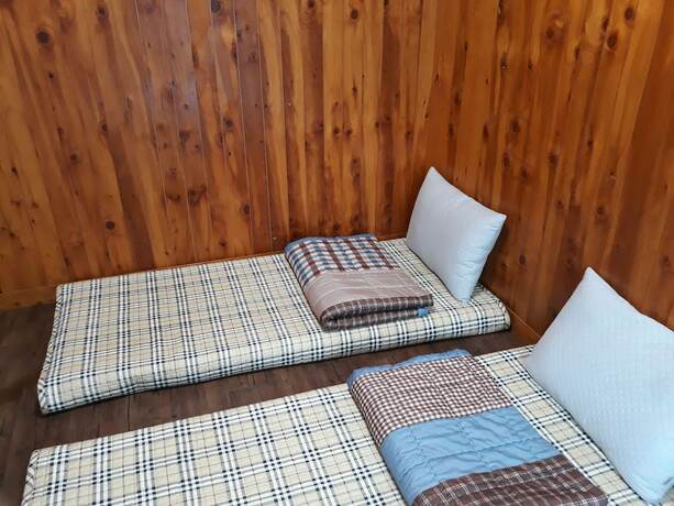 Imagen de la habitación del Hotel With Guesthouse. Foto 15