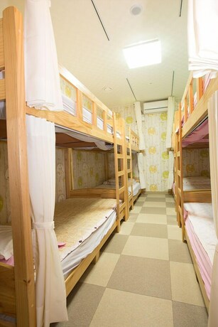 Imagen de la habitación del Hotel With Guesthouse. Foto 18