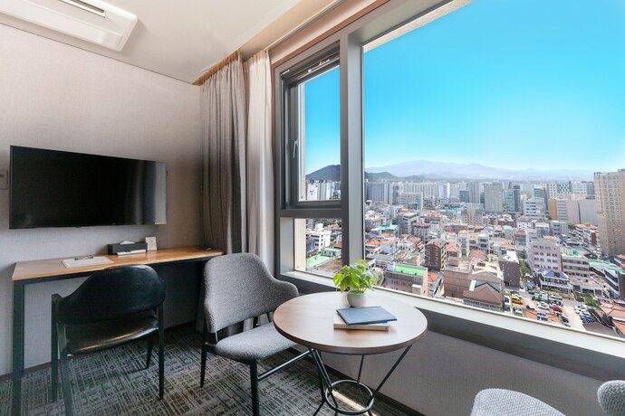 Imagen de la habitación del Hotel Withstay. Foto 18