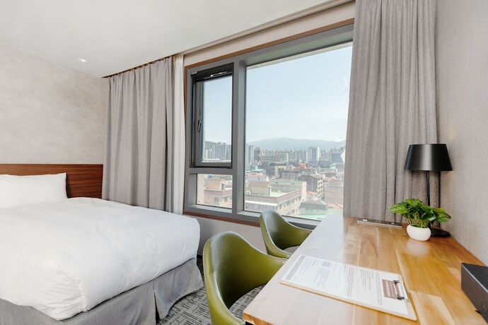 Imagen de la habitación del Hotel Withstay. Foto 19