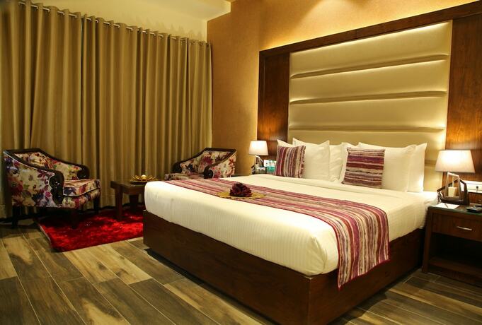 Imagen de la habitación del Hotel Wj Grand. Foto 17