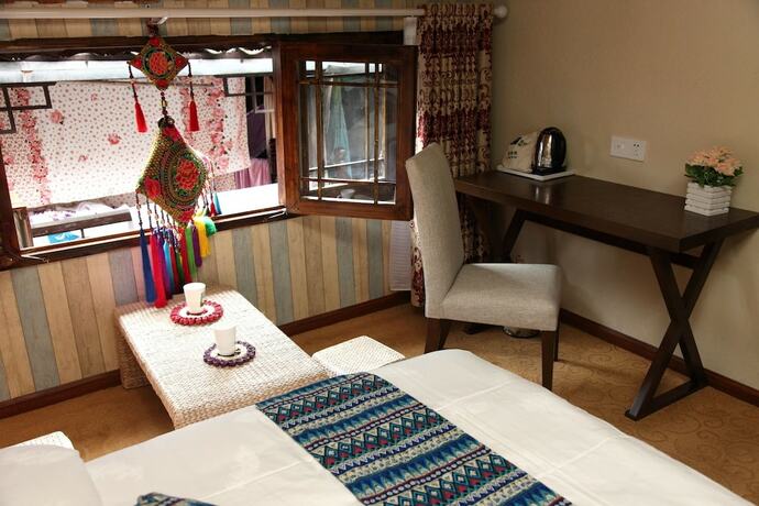 Imagen de la habitación del Hotel Wogo Hotel. Foto 9