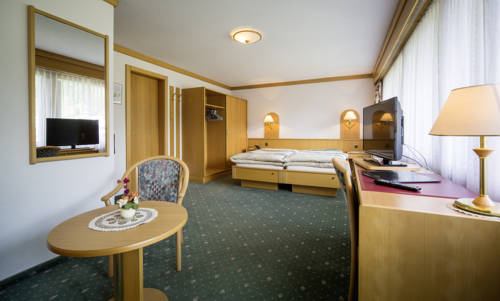 Imagen de la habitación del Hotel Wohlf&uuml;hlhotel Alpenhof. Foto 4