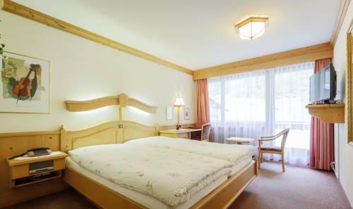 Imagen de la habitación del Hotel Wohlf&uuml;hlhotel Alpenhof. Foto 10