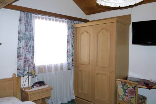 Imagen de la habitación del Hotel Wohlf&uuml;hlhotel Alpenhof. Foto 11