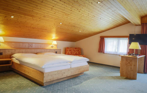 Imagen de la habitación del Hotel Wohlf&uuml;hlhotel Alpenhof. Foto 16