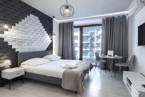 Imagen de la habitación del Hotel Wola Luxury Stay. Foto 32