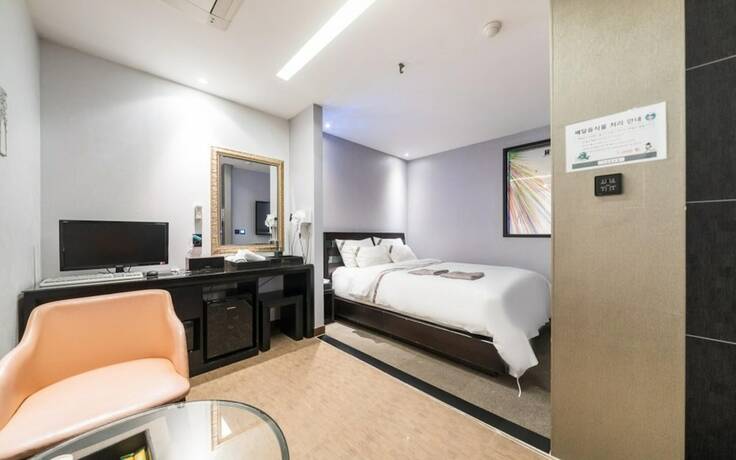 Imagen de la habitación del Hotel Wolmido W Tourist. Foto 15