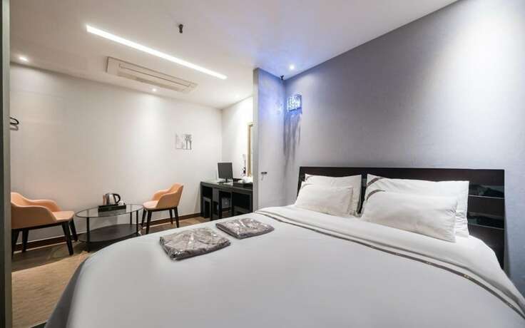Imagen de la habitación del Hotel Wolmido W Tourist. Foto 16