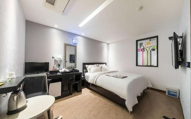 Imagen de la habitación del Hotel Wolmido W Tourist. Foto 17