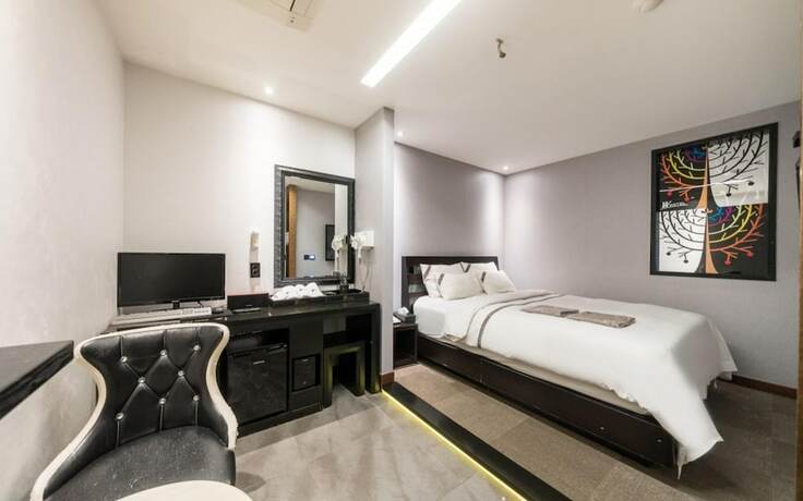 Imagen de la habitación del Hotel Wolmido W Tourist. Foto 18