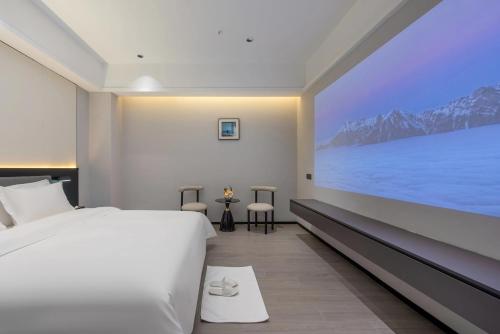 Imagen de la habitación del Hotel Wonderful Guangzhou Changlong Guangdi Garden Branch - Free Shuttle Bus to Canton Fair Complex. Foto 13